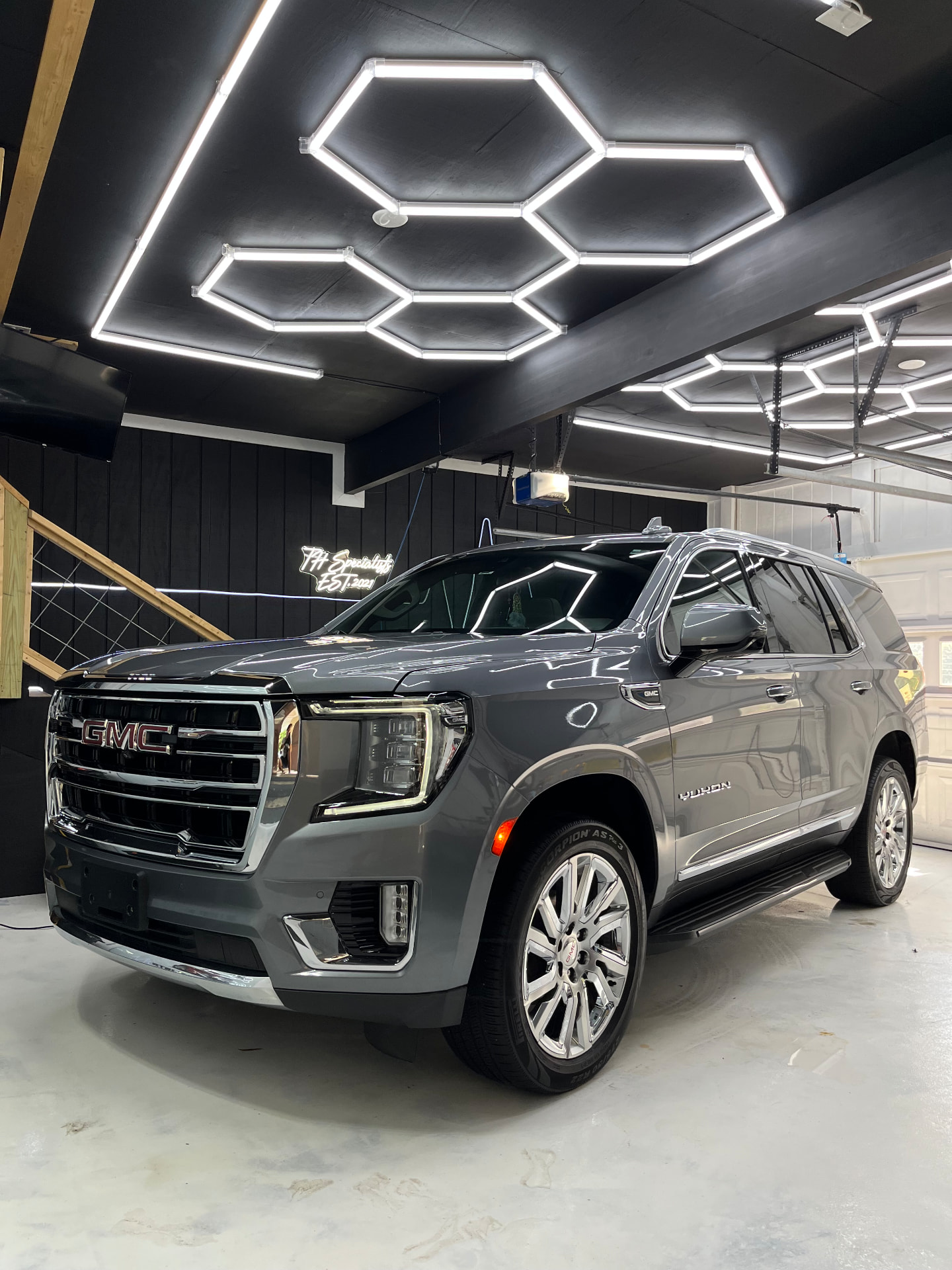 GMC Yukon detailed and tinted inside the THSpecialists shop in Gwinnett County, GA